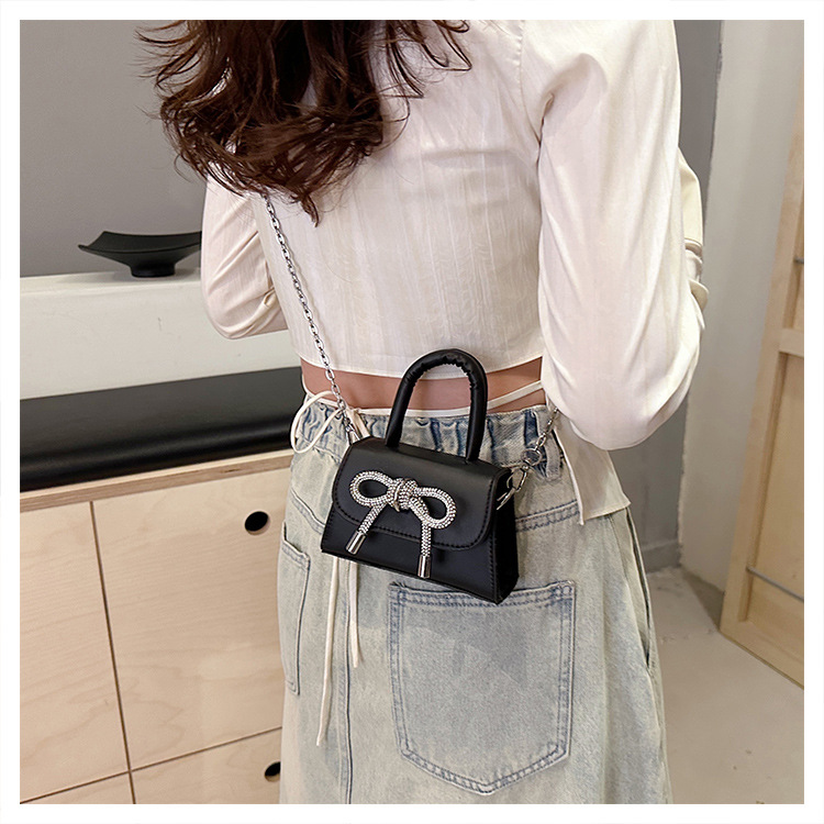 Ins niche French textured bag female 2024 new bow small square bag stylish shoulder messenger bag_voghion.com