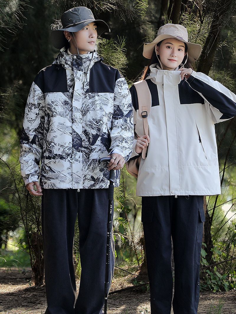 Chaqueta de invierno al aire libre para hombres y mujeres tres en uno de dos piezas de lana engrosada chaqueta de alpinismo a prueba de viento al por mayor en vivo