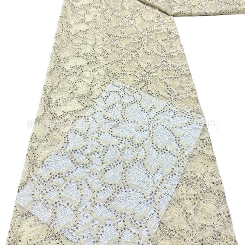 Nuevo hueco flor de encaje fondo tela de perforación caliente pesada cola de pez vestido de boda vestido de noche brindis tela spot