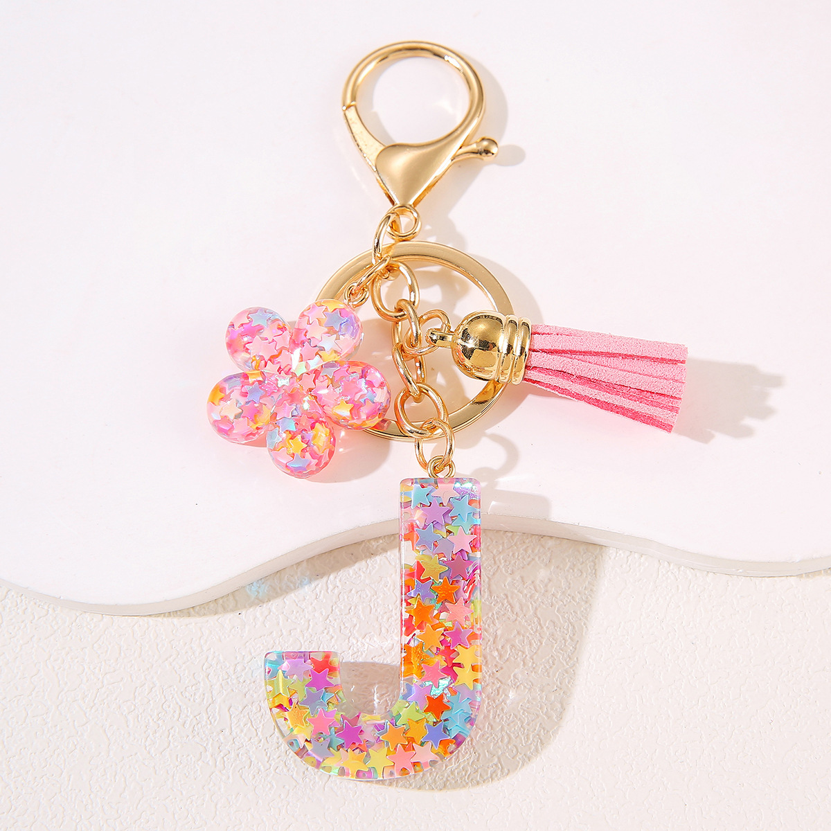 Un nuevo llavero flor de goteo de goma esquinilla 26 letras bolsos colgante llavero accesorios Yiwu