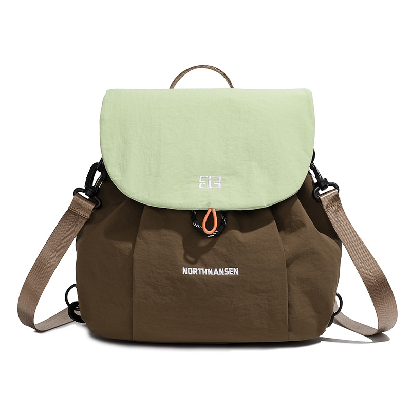 Hombres y mujeres mochila 2025 nueva mochila de estudiantes coreana de gran capacidad, mochila escolar de estilo universitario, mochila de viaje ocio