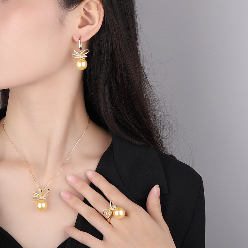 Zhuang Sheng joyería cobre inferior chapado en oro nuevo incrustaciones de oro ligero rebordear estilo coreano arco diamante traje femenino 14mm