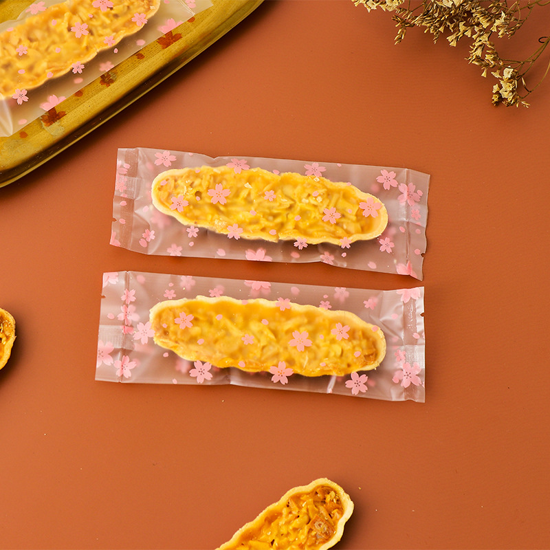 Clásico tipo barco de arroz glutinoso embalaje rectangular máquina de hornear bolsa de sellado en stock fábrica al por mayor bolsa de embalaje de piruletas