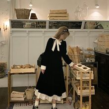 安妮不火 撞色蝴蝶结连衣裙女胖秋季法式荷叶边微胖显瘦小黑裙