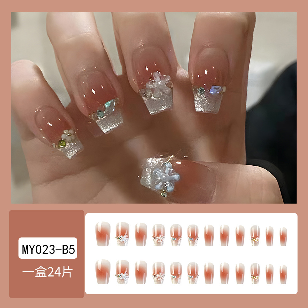 Uñas portátiles de tendencia en TikTok con una sensación de alta gama para el otoño, puro deseo, pegatinas de arte de uñas portátiles con ojo de gato y sonrisa rosa brillante.