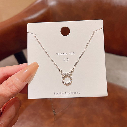 Light Luxury, Niche Zircon Bowknot Titanium Steel Necklace for Women – Versatile, Elegant, Minimalist Design, Trending Online, Same Style as Influencers' Clavicle Chain