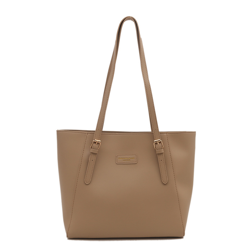 Gran capacidad de ocio retro bolso 2024 nueva moda simple de color sólido extranjero bolso de hombro portátil de mujer debajo de la axila