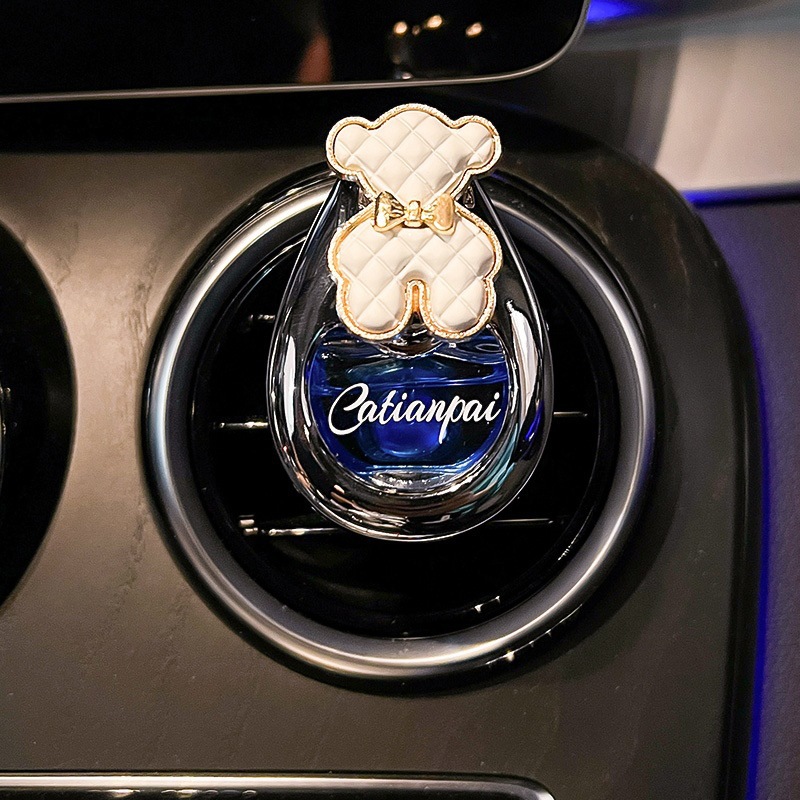 Perfumes de automóviles, salidas de aire, adornos de automóviles