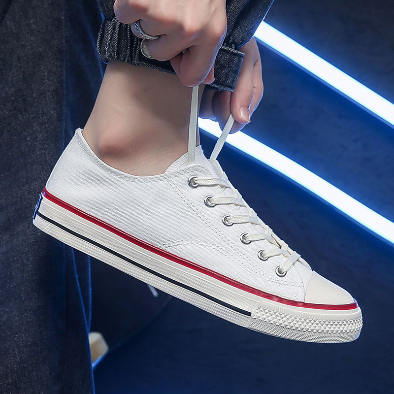 Zapatillas de lona a la moda 2025 para hombre, calzado casual para parejas, zapatillas juveniles, transpirables, suministro del fabricante, cómodas, de suela plana, versátiles.