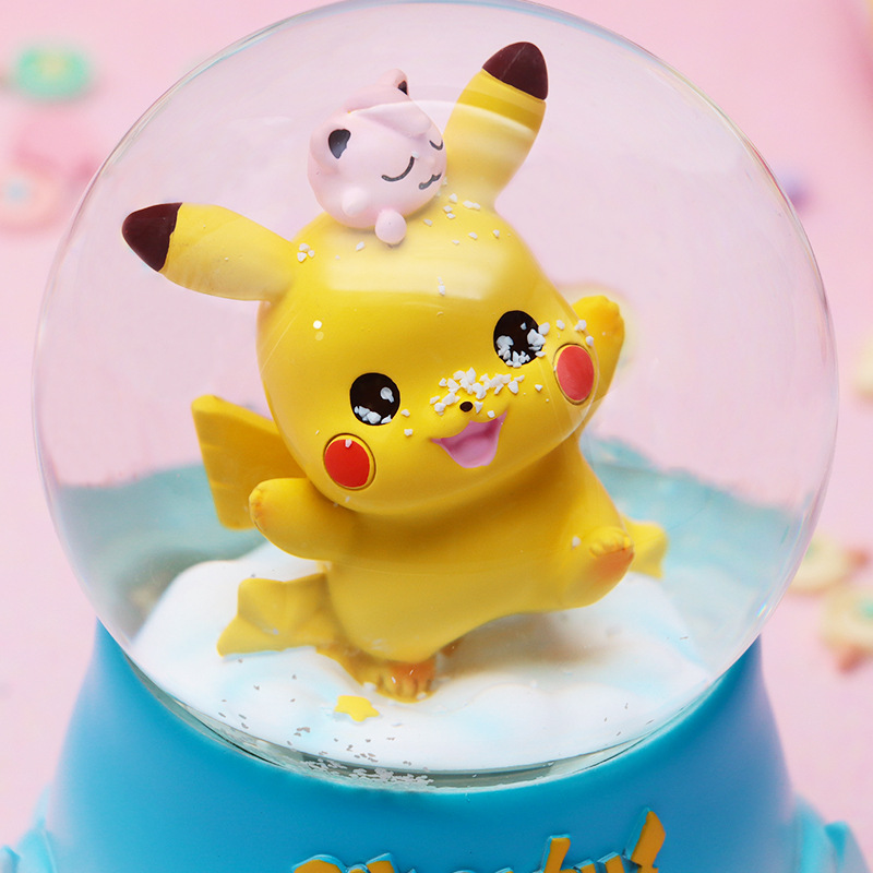 Pequeño libro rojo venta caliente dibujos animados lindo Pikachu bola de cristal caja de música caja de música luminosa para estudiantes y niños regalos