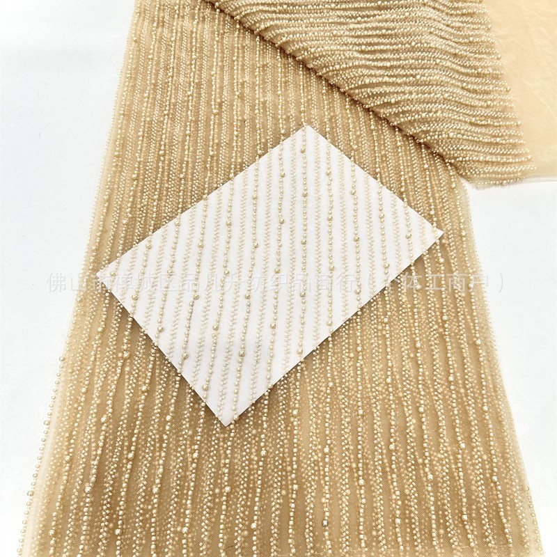 Tubo de perlas bordado cadena de perlas tela de perlas vestido de boda moda vestido vestido ropa infantil tela suministro de stock