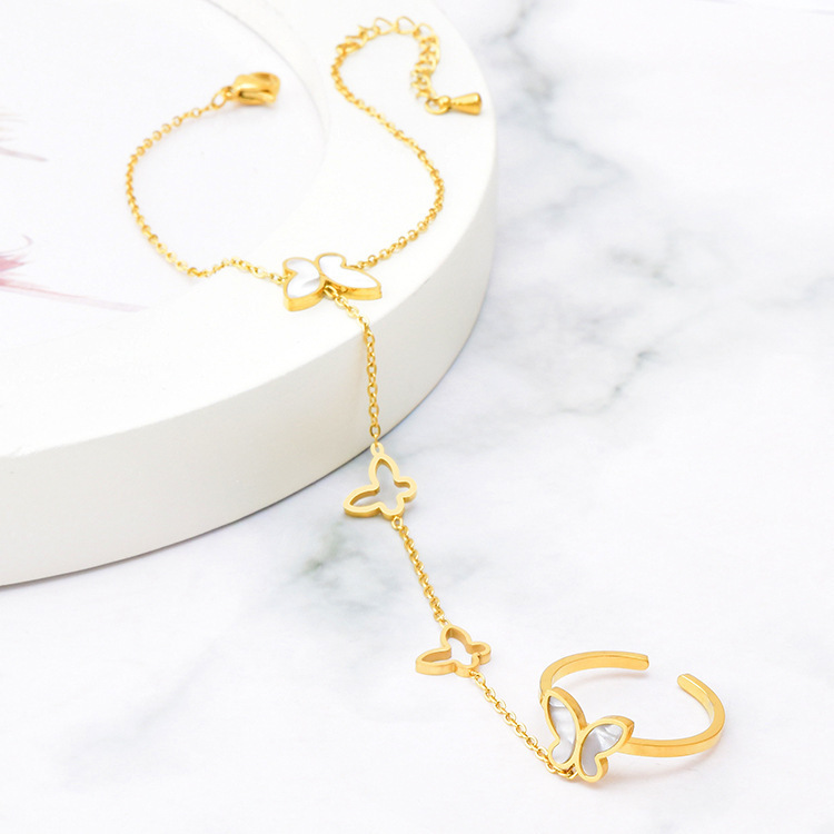 Fashion Internet Red with White Shellfish Flower Open Ring Bracelet Integrated Hand Back Chain Titanium Steel Bracelet Women's Cross-border Wholesale