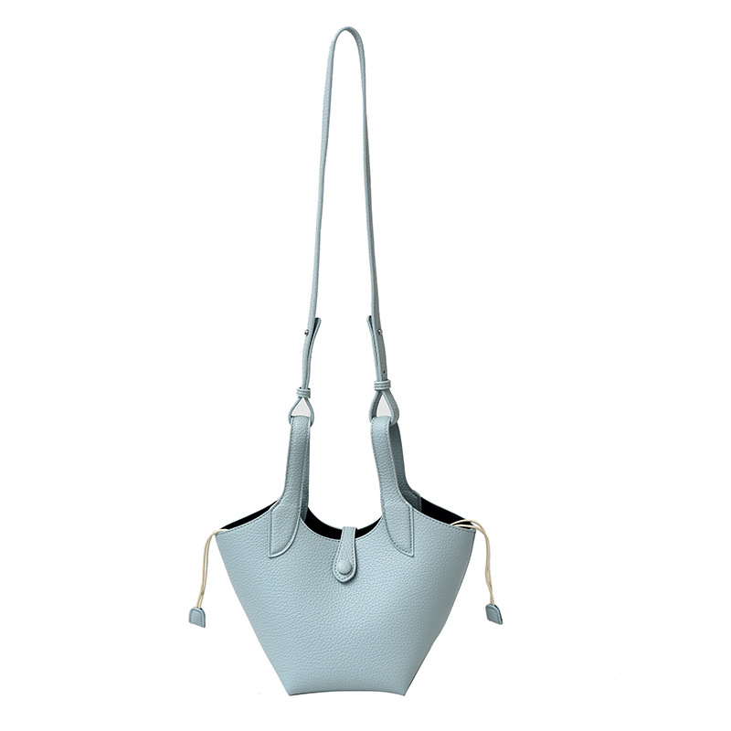 Bolsa de axila de textura de nicho Bolsa de mujer 2025 primavera nuevo bolso de cubo bolso de canasta de mensajero de un solo hombro simple