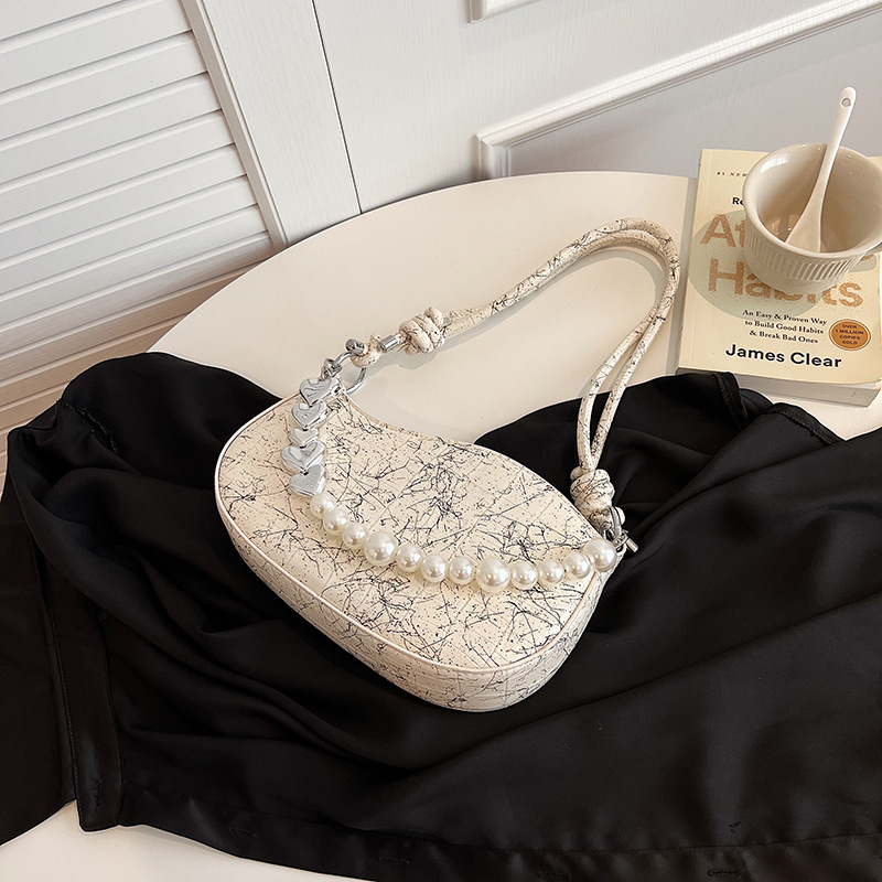 French chain armpit bag, women's high-end sense, niche trendy fashion handbag, western-style crescent bag_voghion.com