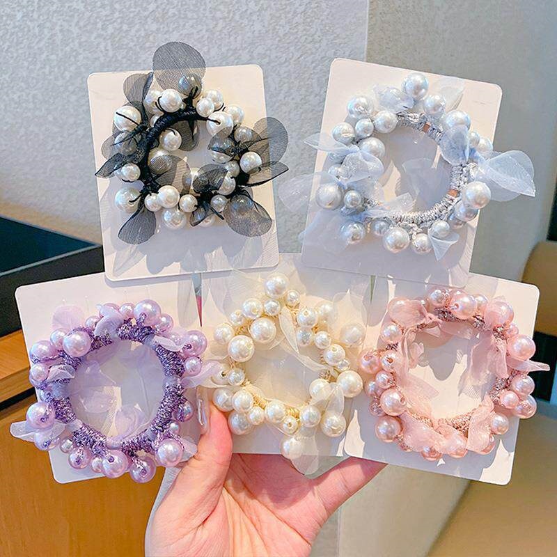 Moda nueva alta sensación de cabello de perla nueva línea de cabello de alta gama de cabello de cabello de mujer bola de cabello anillo de cabello flores