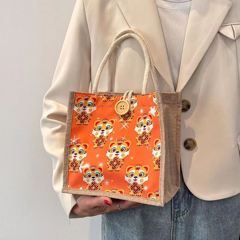 Algodón y lino Bento bolso bolsa para las mujeres 2022 Nuevo Tigre año de estilo occidental caja de almuerzo bolsa ins gran capacidad pequeña bolsa de hombro