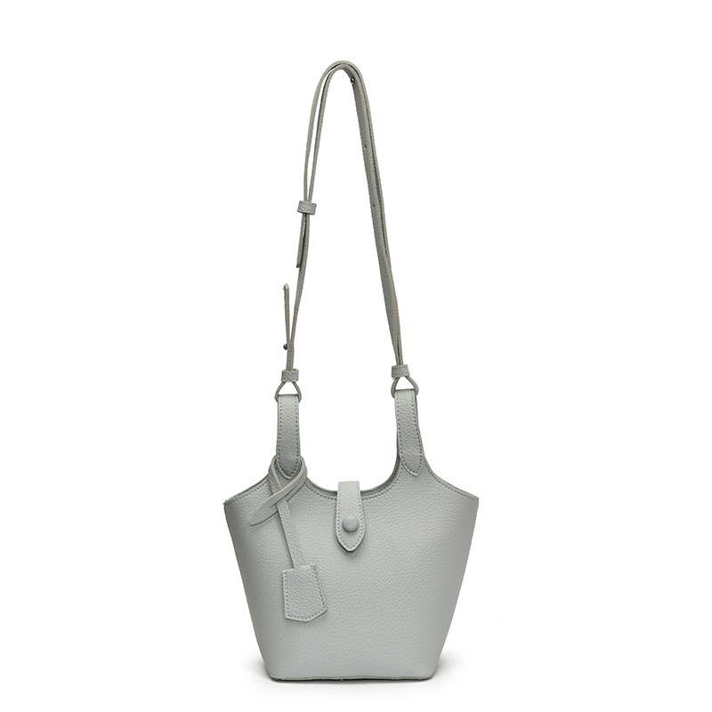 Bolsos de cesta de verduras populares de este año para mujer 2025 nuevo bolso de hombro súper caliente bolso de cubo de ocio simple