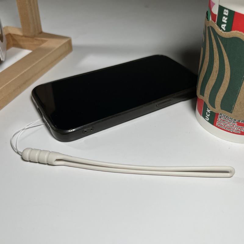 携帯電話のストラップの手首の短い携帯電話のチェーンの鍵のuディスクの部品の液体のシリカゲルのエアポッドプロの2ストラップを適用します。|undefined