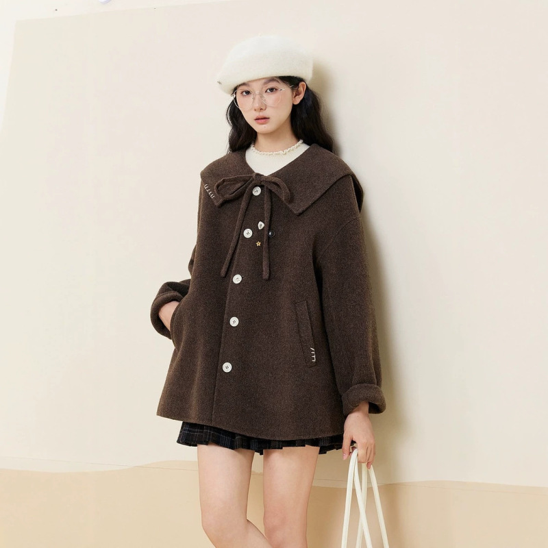 New winter women's long brown wool coat with navy collar, bow tie, and double-sided wool fabric