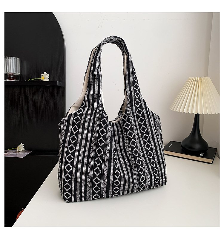 Estilo chino artístico de moda simple bolsa de mujer 2024 invierno nuevo estilo occidental todo partido hombro axila bolsa abierta