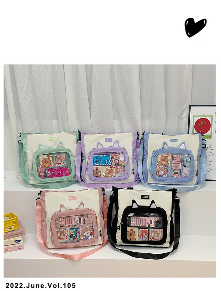 The new cute cartoon printed student bag with a large capacity and transparent student storage single-shoulder bag is selling well for women undefined