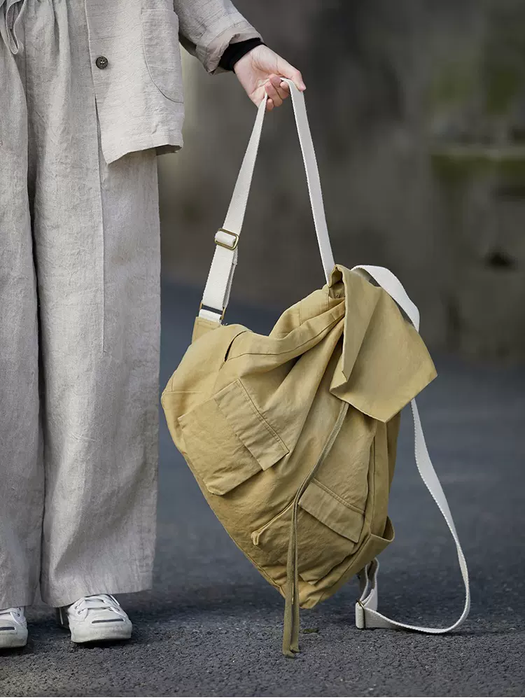 四季款卡其色四季款大容量斜纹束口休闲双肩大背包
