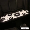 Briquettes [long cushions for three people in the back row]