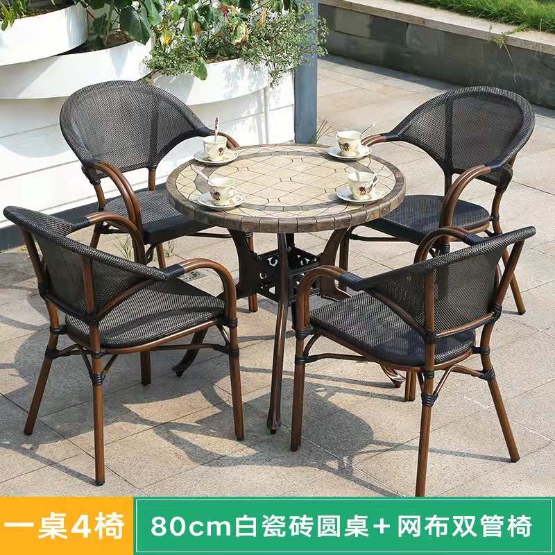 Mesa y silla al aire libre leche tienda de té cafetería silla de malla Silla de ratán Patio de tres piezas balcón mesa y silla de ocio al aire libre