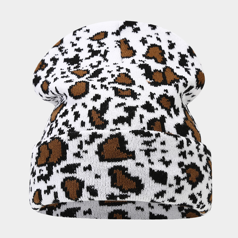 Moda europea y americana Nueva leopardo Jacquard sombrero de punto engrosado cálido hombres y mujeres otoño e invierno Gran circunferencia de la cabeza protección del oído sombrero de lana