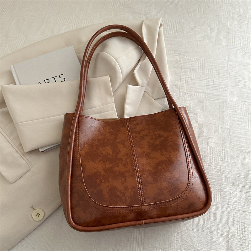 Bolsos populares para mujer 2024 otoño e invierno nuevo estilo coreano retro de gran capacidad para viajar en clase bolso de hombro bolso de moda