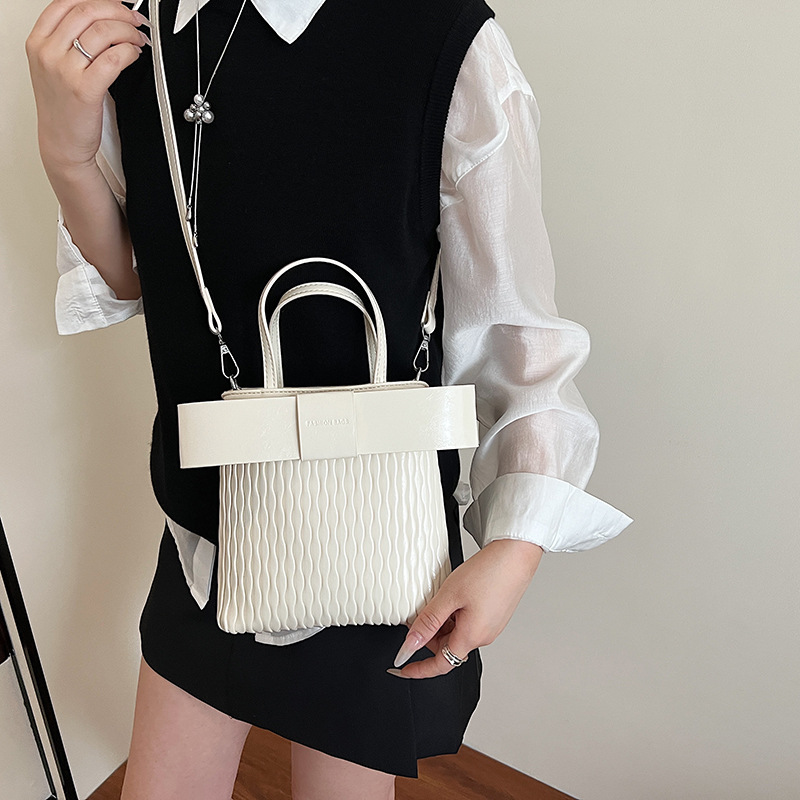 Bolso de moda coreano 2025 verano nuevo bolso femenino lazo princesa bandolera bolso bandolera corrugado fresco
