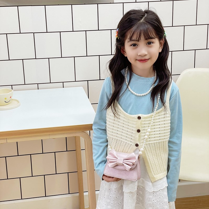 Coreano estilo extranjero mini niñas bolso de hombro lindo arco bebé mochila nueva moda bolso de cadena para niños