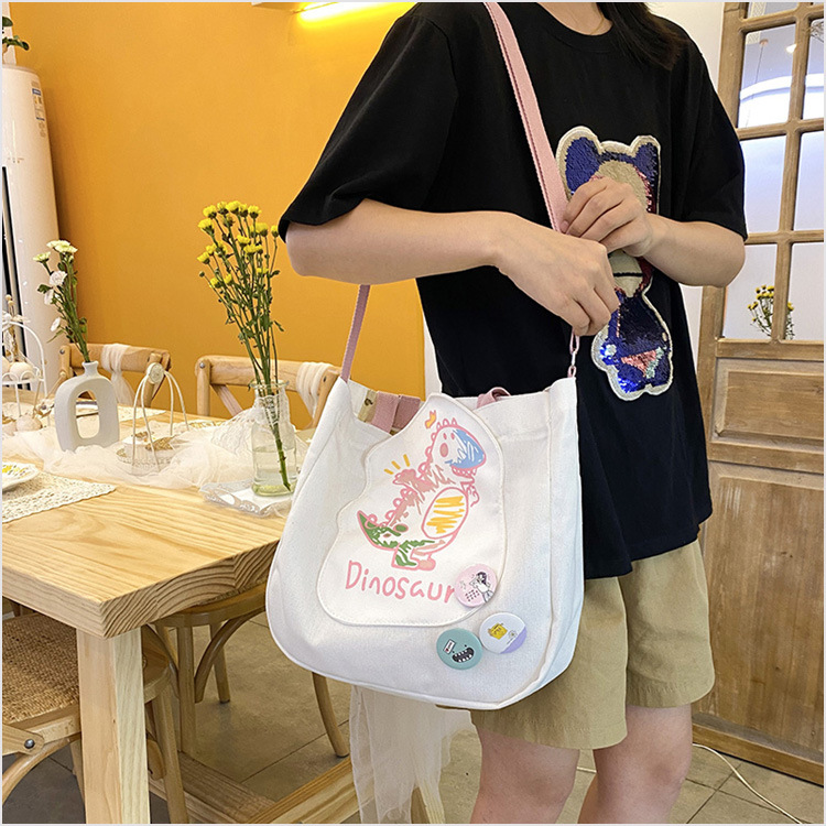 Cute Crossbody Large Capacity Canvas 2021 New Ins Japanese One Shoulder Women's Bag Cute Sister Portable Tote Bag display picture 4