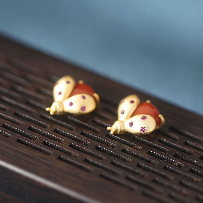 S925 Sterling Silver Gold-plated Inlaid Red Agate Worm Earrings display picture 4