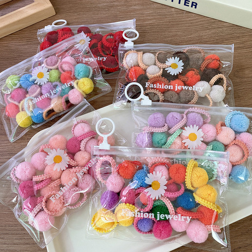 20 bags of macaron candies, colorful autumn and winter plush balls, small fungus-edged hair ties for children, all-match headbands