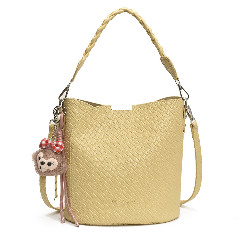 Bolso de moda bolso de axila de gran capacidad 2025 nuevo bolso de hombro de tendencia bolso de mensajero de todo fósforo bolso de cubo de color sólido