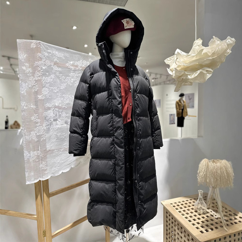 (The length of real goose down to the middle of calf) Go to the northeast to lengthen the 90 goose down jacket for ladies to thicken down jacket