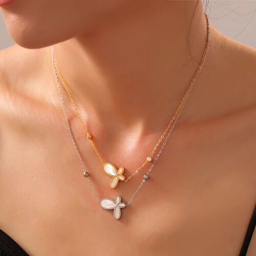 Elegant French-style jewelry set featuring a delicate, butterfly-shaped pendant with white shell inlay and a gentle, feminine design—crafted from titanium steel with gold-plated finish.