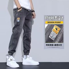 クロスボーダーのハレンジーンズの男性の秋の薄いタイプのゆるい束の足の服装のカジュアルな9分のズボンの新型の韓国版のファッションの男性