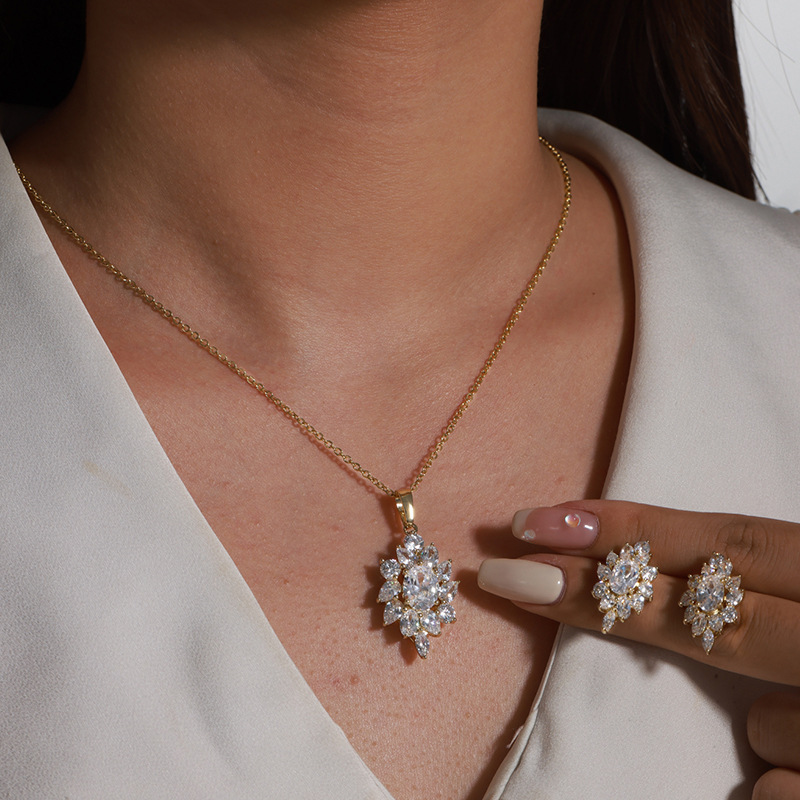 Xuping aleación chapada en oro con microincrustaciones de temperamento de circonio, lujo ligero, traje de moda europeo y americano, pendientes, colgante, collar de dos piezas para mujer