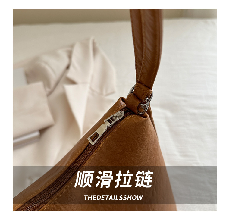 The 2024 new pleated tote bag is a large-capacity casual and fashionable backpack for women, featuring multi-functional texture and a single-shoulder crossbody bag undefined