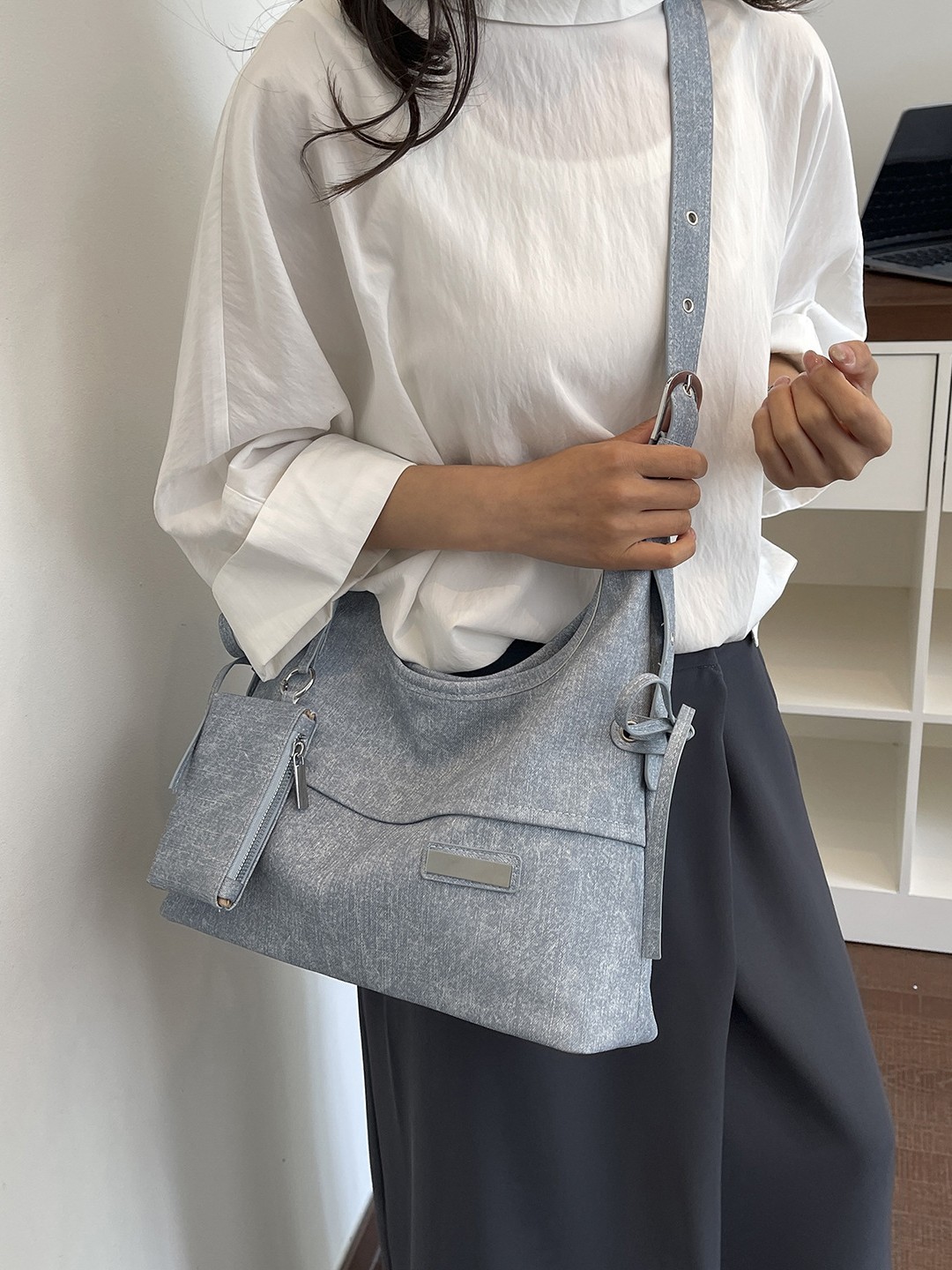 Bolso coreano de gran capacidad para mujeres 2026 verano nuevo viaje transfronterizo tote bag retro nicho mochila de hombro