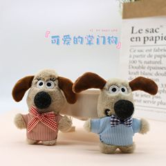 かわいいアニメのぬいぐるみのぬいぐるみの全身の番手の犬のブローチの小さい包みはアクセサリーの服の補助材料を掛けます。