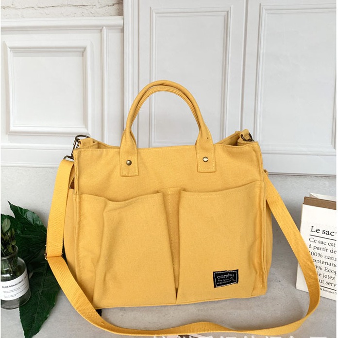 Nuevo estilo japonés bolsa de lona bolsa de mensajero de las mujeres de moda simple bolsa de tela estudiante bolso de lona casual