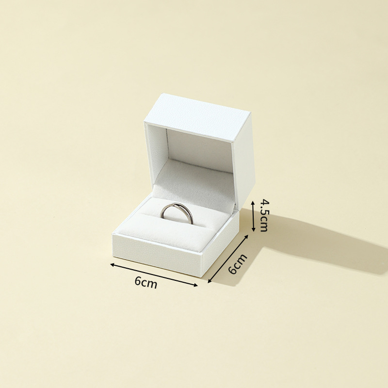 Spot caja de embalaje de joyería de ángulo recto propuesta de matrimonio anillo de confesión embalaje de anillo de diamantes caja de joyería caja de tapa de alta gama