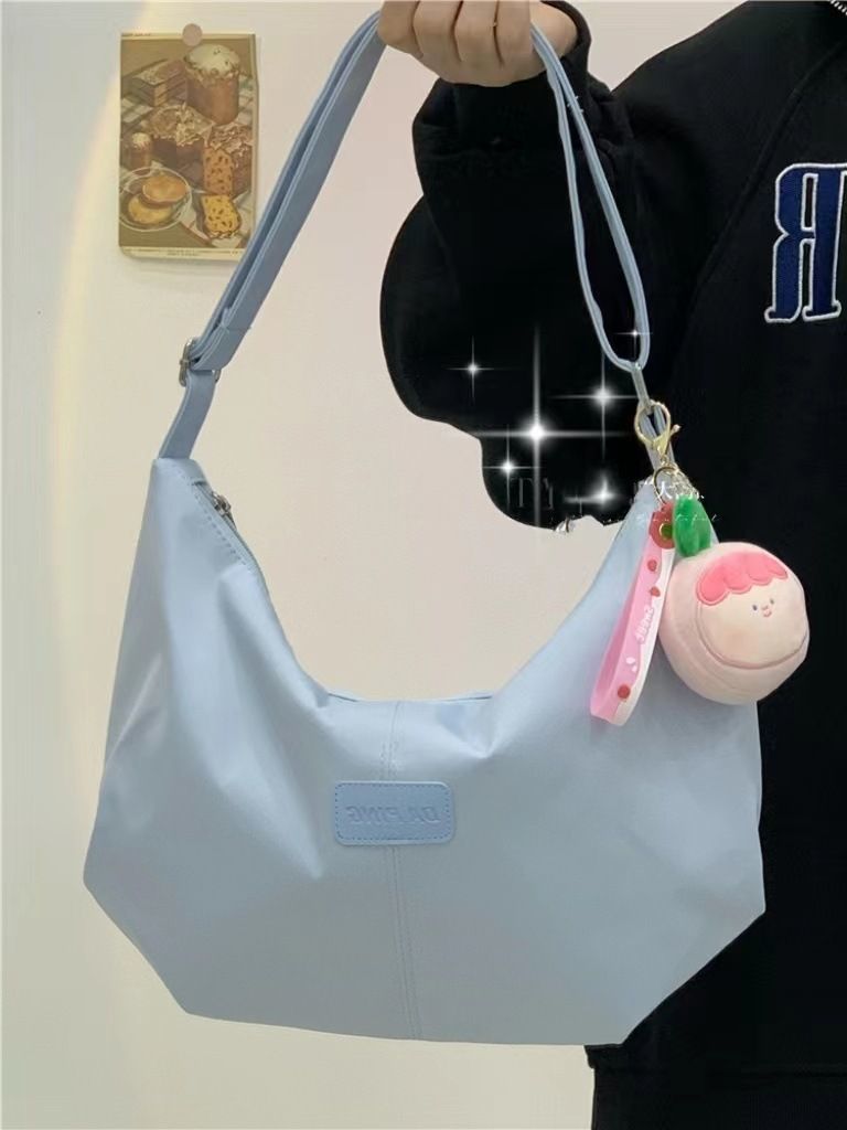 大容量饺子包包女2025新款百搭尼龙单肩包学生上课通勤斜挎包