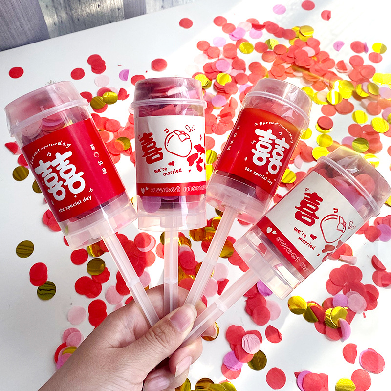 Boda tubo de pulverización boda pequeño regalo pistola mano empuje giro pistola cumpleaños pequeño regalo bomba empuje música