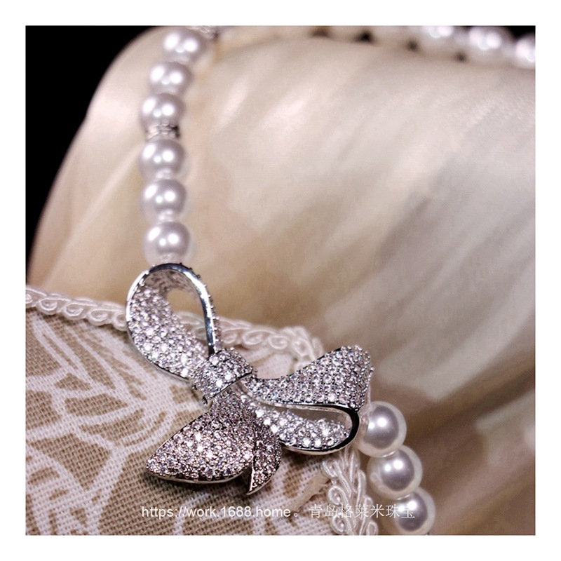 Elegant retro trend fashionable necklace with zircon with bow from…