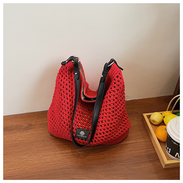 Summer hollowed-out knitted underarm bag for women, 2025 new style, laid-back and relaxed, seaside vacation style single-shoulder crossbody bag undefined
