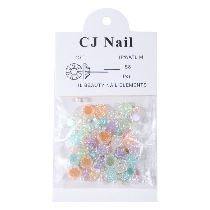 Uñas belleza hielo transparente resaltar Camelia decoraciones de uñas diamante suave tridimensional resina Internet celebridad Rosa bola de acero mezclado